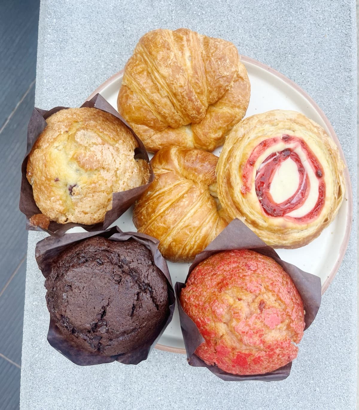 Assorted pastries: croissants, muffins, danishes